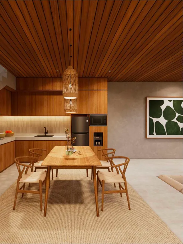 Nusakha Villas shared living space — natural stone, rich wood textures and bespoke ambient lighting